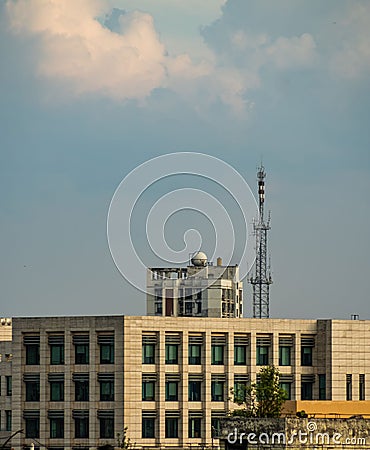 Vertical shot of urban buildings in Deyang, China, in cloudy sky background Stock Photo