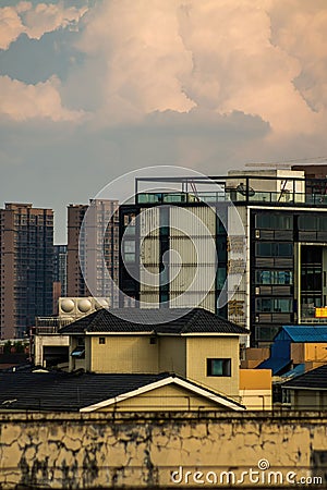 Vertical shot of urban buildings in Deyang, China at sunset Stock Photo