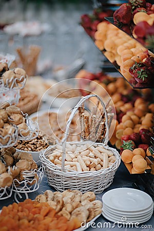 Vertical shot of wedding candy bar with nuts and pastry Stock Photo