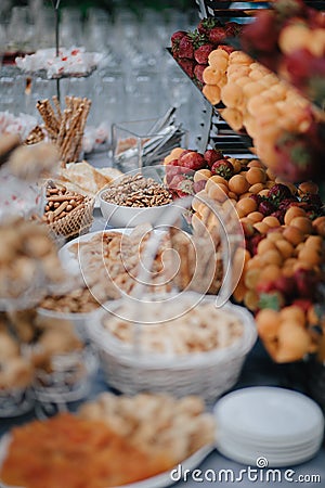Vertical shot of wedding candy bar with nuts and pastry Stock Photo
