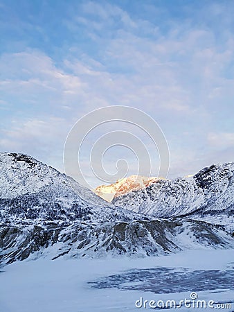 Vertical shot of the winter in the Arctic region, Kvaloya Island, Tromso, Norway Stock Photo