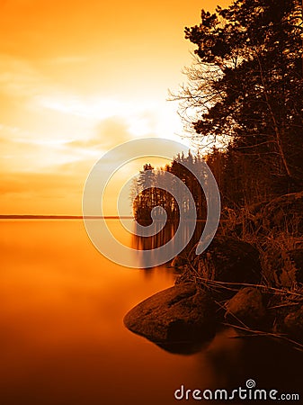 Vertical sunset on lake andscape background Stock Photo