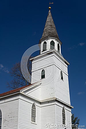 Vertical three quarter view of Village of Warwickâ€™s historic Old School Baptist Meeting house Editorial Stock Photo