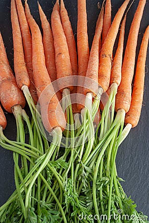 Vertical top view of bunch of carrots Stock Photo