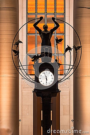 Vertical of Toronto Union Station Outdoor Clock with Statue behind it Editorial Stock Photo