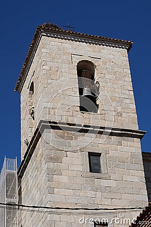 Vertical view. Bell tower of the Parish Church of the Assumption (16th century). Cadalso de los Vidrios, Madrid, Spain Stock Photo