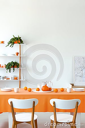 Vertical view of dining room table set for dinner Stock Photo