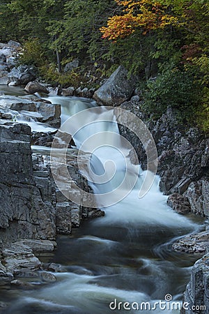 Vertical view of foliage and Swift River waterfall, New Hampshire. Stock Photo