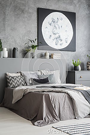 Vertical view of a modern bedroom interior in grey color with a Stock Photo