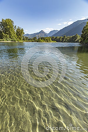 Vertical views of mountains in the background of Wenatchee River Stock Photo