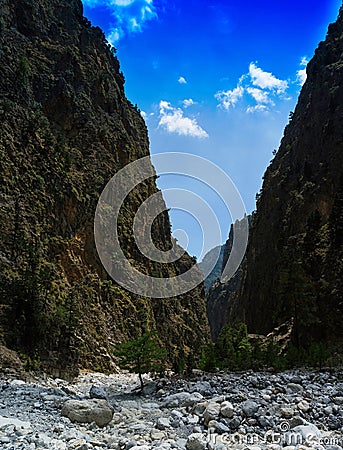 Vertical vivid vibrant mountain cleft landscape Stock Photo