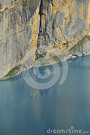 Vertical wall and Oeschinensee. Kandersteg. Berner Oberland. Switzerland Stock Photo