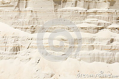 Vertical wall of sand in sand pit Stock Photo