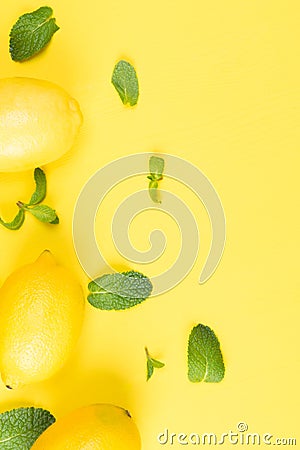 Vertical yellow background, with fruits and mint, lemon Stock Photo