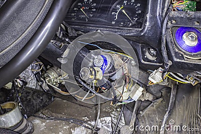 Very bad and dangerous electrics in the old cabin of a broken down car Stock Photo