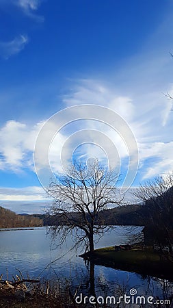 Very beautiful sky overlooking the cold lake Stock Photo