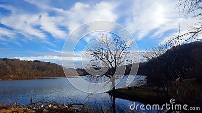 Very beautiful sky overlooking the cold lake Stock Photo