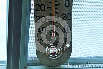 Very Cold Temperature Shown on Thermometer Stock Photo