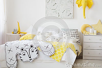 Very cosy bedroom with a large bed full Stock Photo