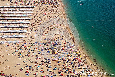 Very crowded beach in Portugal Stock Photo