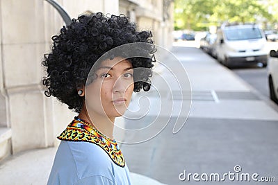 Very cute ethnic girl with frizzy hair Stock Photo