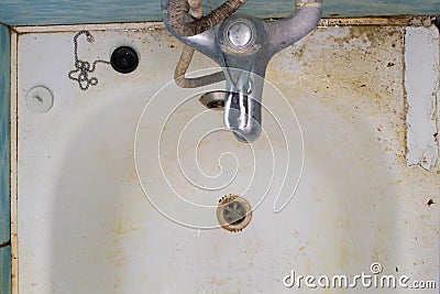 Very dirty bathroom. Very dirty bath, water drain, sewerage, water faucet mixer tap Stock Photo