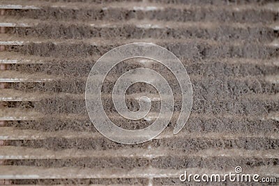 Very dirty and dusty white plastic ventilation grill. Ventilation shaft in the apartment. dirty air filter. House cleaning concept Stock Photo