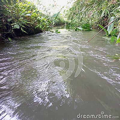 Very dirty water but your heart is much cleaner Stock Photo