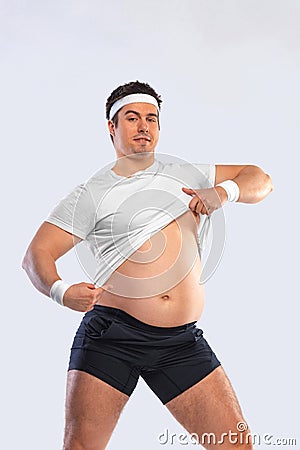 A funny fat man isolated on white background. Obesity and eating disorder. Concept for dietetics and fitness advertising Stock Photo