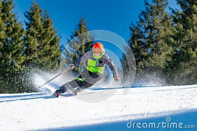 Very good skier during a carving curve Stock Photo