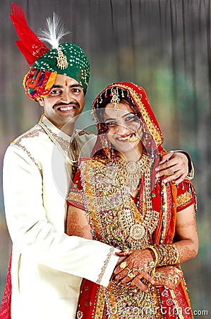 Very Happy Indian couple on their wedding day Stock Photo