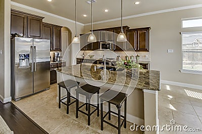 Very Nice Kitcen with Island and Breakfast Bar and Stainless Appliances Stock Photo