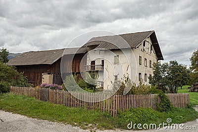 very old abandoned farm among a pasture in Val Gardena Editorial Stock Photo