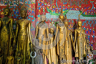 Very old Buddha statues in Wat Xieng Thong in Luang Prabang, Lao Stock Photo