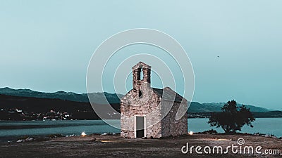 Very old small church and inspiring beautiful landscape Stock Photo