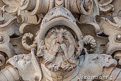 Very old statute of scary and heavy armed gatekeeper, medieval warrior with weapon in historical downtown of Dresden, Germany Stock Photo