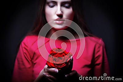 Very pretty woman with rose Stock Photo