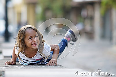 A very pretty 4 year old girl who plays Stock Photo