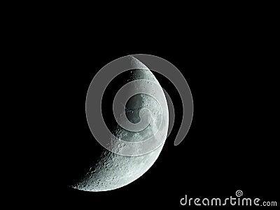 Very sharp close-up of the rising crescent moon in the night sky Stock Photo