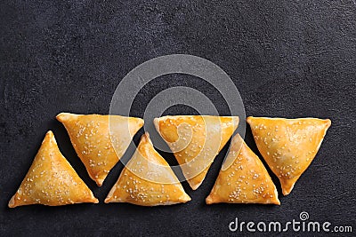 Very tasty samosa on a black background, top view. Place for text Stock Photo