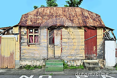 Very typical wooden house in Roseau, the Capital of Dominica in the Caribbean Stock Photo