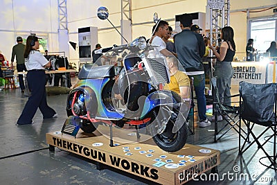 Vespa Piaggio motorcycle at Ride Ph in Pasig, Philippines Editorial Stock Photo