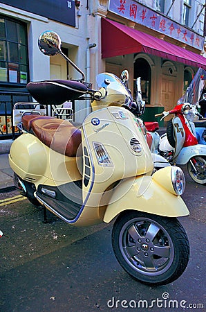 Vespa Scooter in Soho, London Editorial Stock Photo