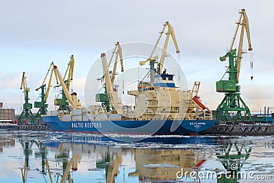 Vessel for transportation of containers-refrigerators Baltic spring berth at the cargo port of St. Petersburg Editorial Stock Photo