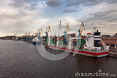 The vessels in port standing on unloading Stock Photo
