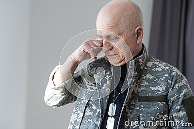 Veteran soldier in military uniform Stock Photo