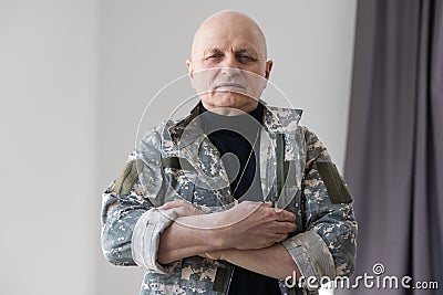 Veteran soldier in military uniform Stock Photo