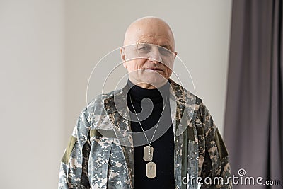 Veteran soldier in military uniform Stock Photo