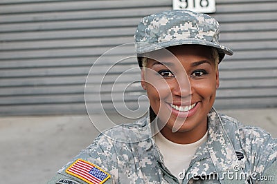 Veteran Soldier smiling and laughing. African American Woman in the military Stock Photo