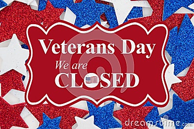 Veterans Day closed message with red, white and blue glitter stars Stock Photo